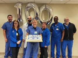 Dr. Asad, Dr. Naughton, Dr. Fadul and staff celebrate the 100th Intuitive Surgical Ion procedure at Saint Francis